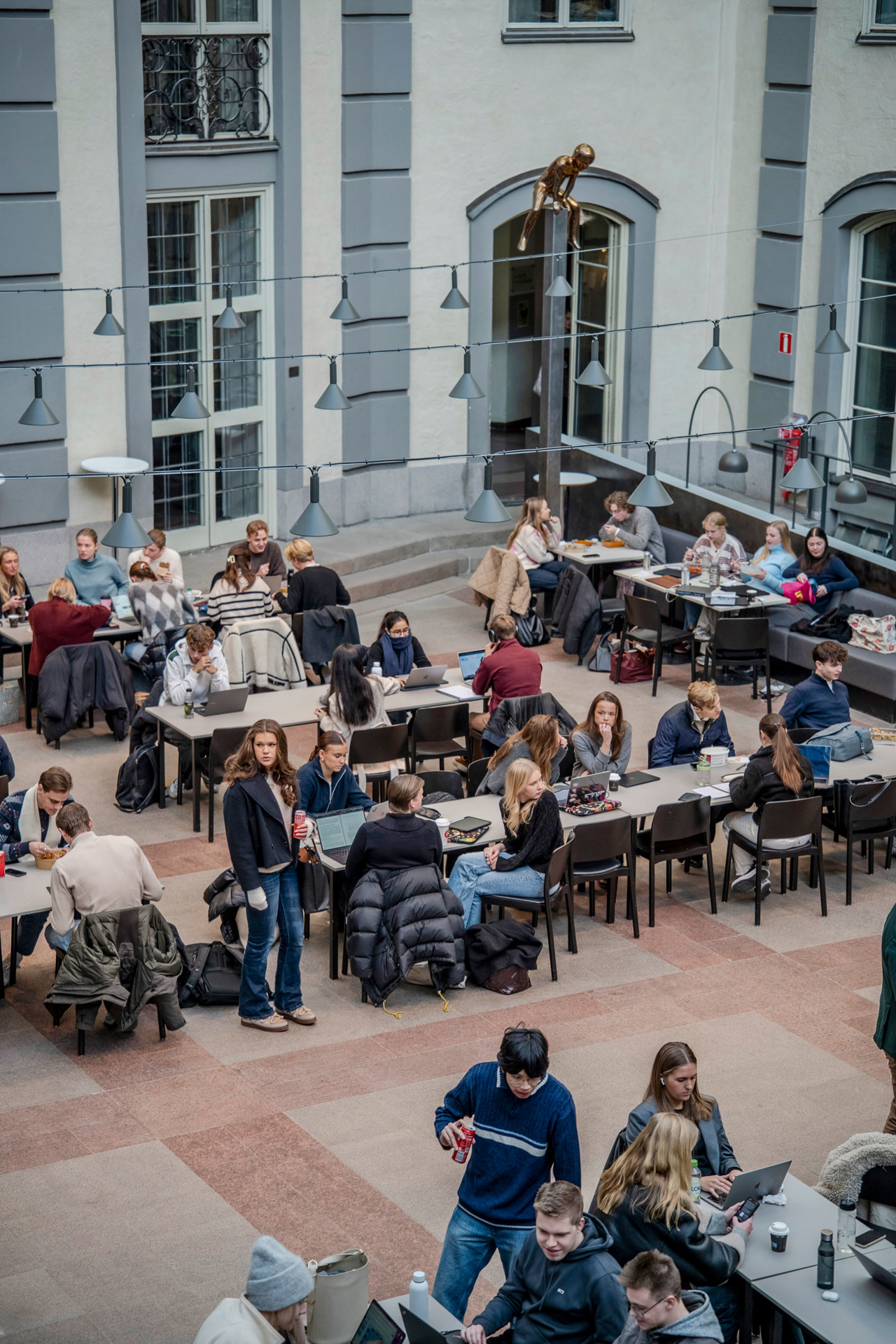 Students studying in the SSE atrium