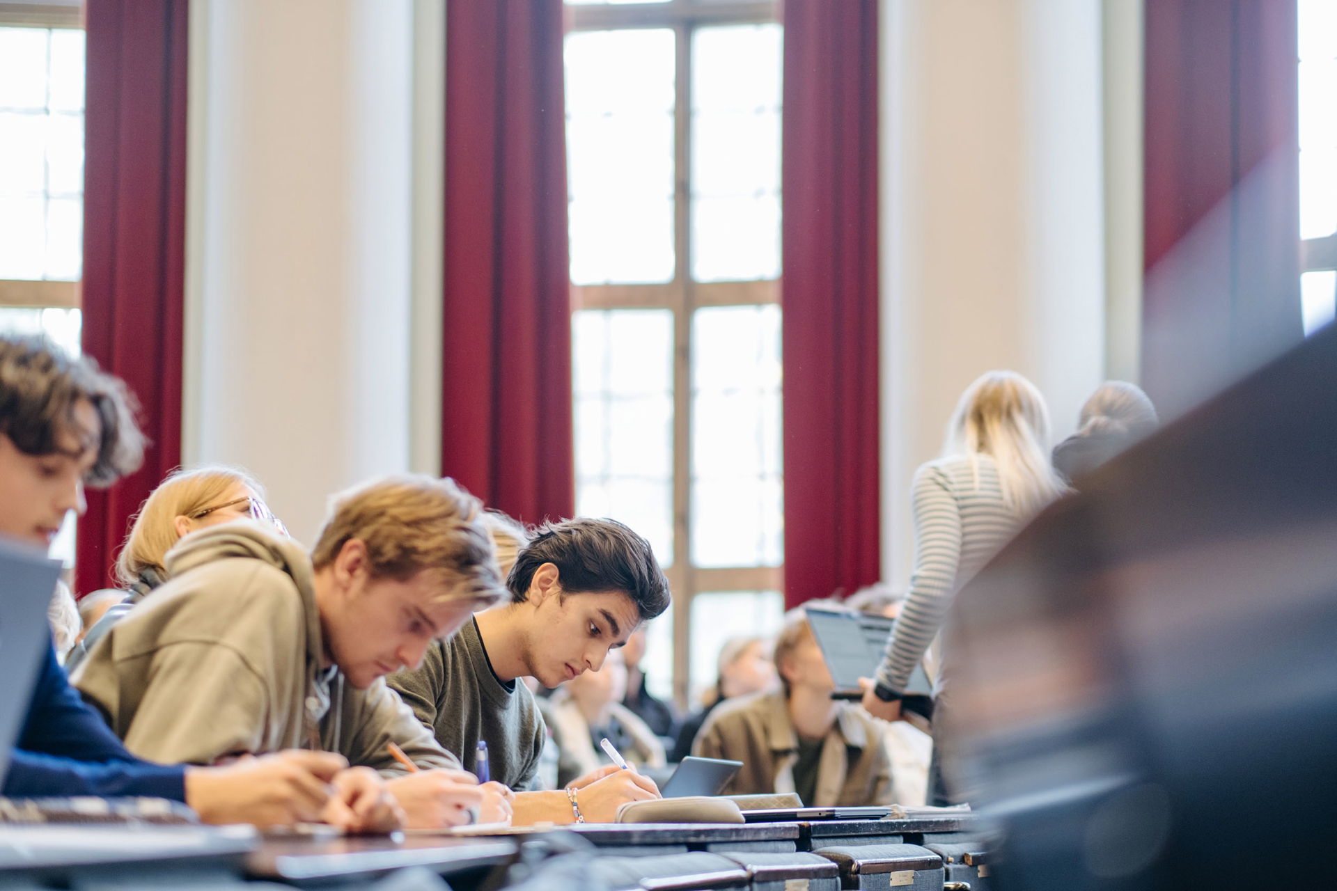 Students working in a lecture hall